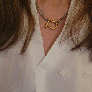 Two toned necklace with gold plated carabiner in stainless steel chain